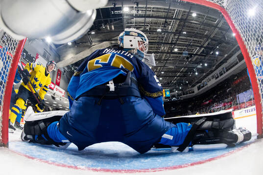 Goaltender Vladimir Nikitin of Kazakhstan