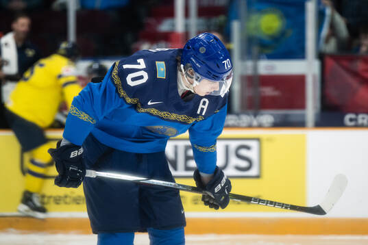 Semyon Simonov of Kazakhstan looks dejected