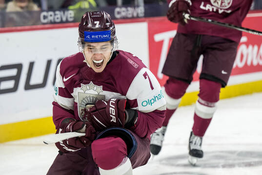 Davids Livsics of Latvia celebrates
