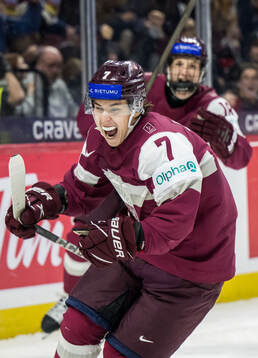 Davids Livsics of Latvia celebrates