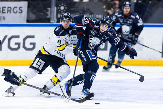 HV71s Henrik Borgström och Linköpings Olle Strandell