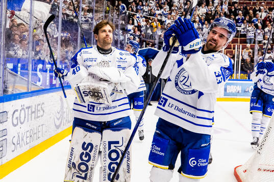 Leksands Eddie Larsson och målvakt Mantas Armalis  jublar