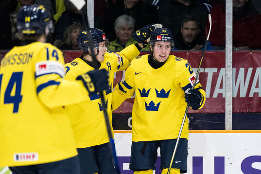 David Granberg of Sweden celebrates with Theo Lindstein