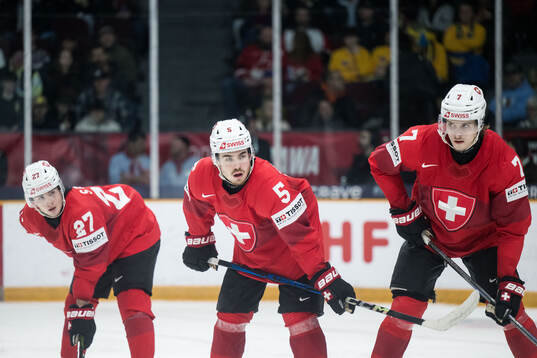 Simon Meier, Leo Braillard and Timo Bunzli of Switzerland