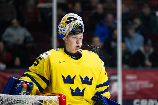 Goaltender Melker Thelin of Sweden