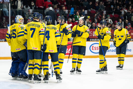 Goaltender Melker Thelin, Viggo Gustafsson and Axel