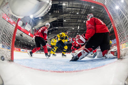 Eric Schneller and goaltender Christian Kirsch of
