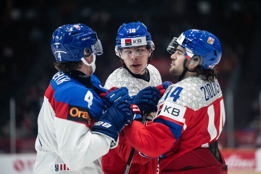 Martin Strbak of Slovakia with Adam Jecho and Adam Zidlicky