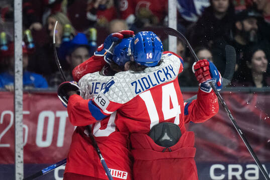 Pavel Simek of Czech Republic celebrates with team mates