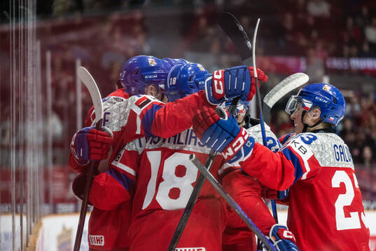 Eduard Sale of Czech Republic celebrates with team mates