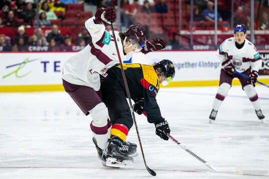 Dmitrijs Dilevka of Latvia and Nick Maul of Germany