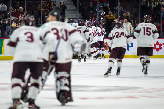 Players of Latvia celebrate