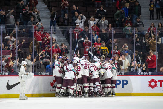 Players of Latvia celebrate