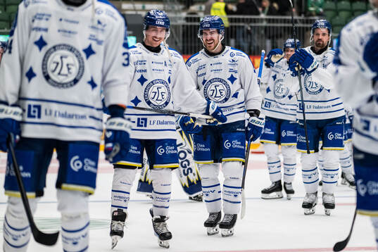 Leksands Justin Glenn Kloos och Matt Caito jublar