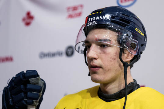 David Edstrom of Sweden is interviewed at a practice session
