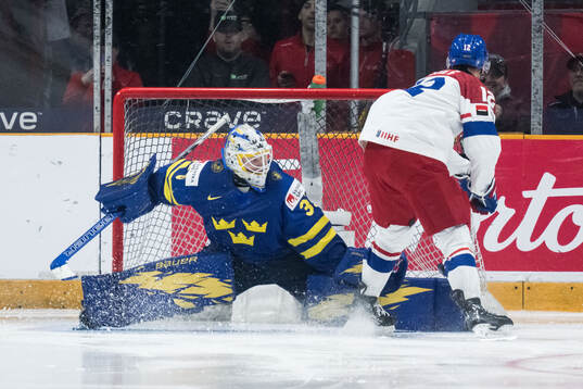 Goalkeeper Melker Thelin of Sweden and Eduard Sale of Czech