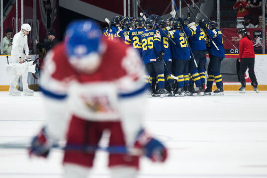 Players of Sweden celebrate