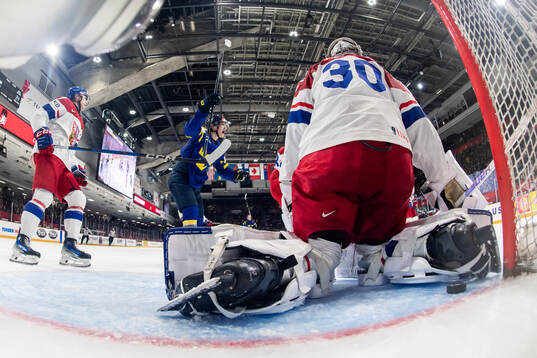 Victor Eklund of Sweden celebrates while Jakub Fibigr and