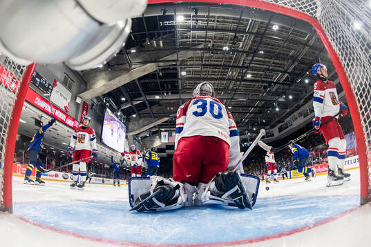 Vojtech Husinecky, goaltender Michael Hrabal and Adam