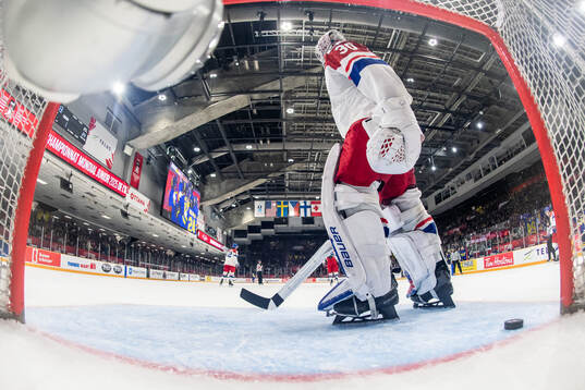 Goaltender Michael Hrabal of Czech Republic looks dejected