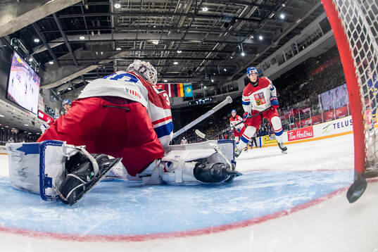 Herman Träff of Sweden (not pictured) scores 1-0 behind
