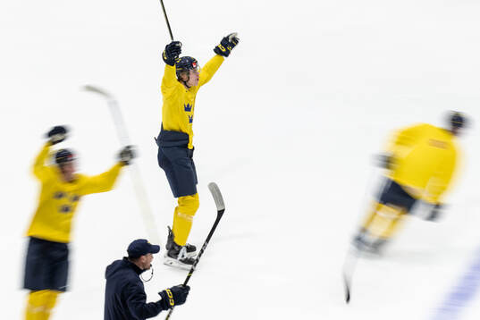 Axel Hurtig of Sweden celebrates at a practice session