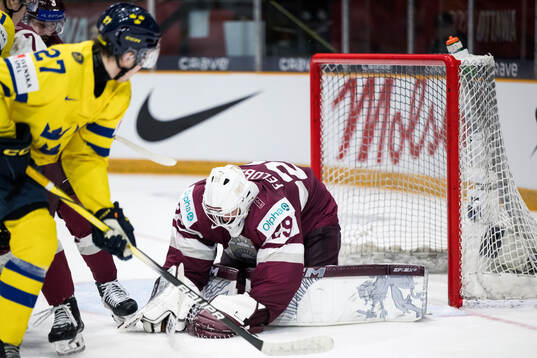 Goaltender Linards Feldbergs of Latvia
