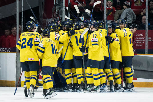 Players of Sweden celebrate