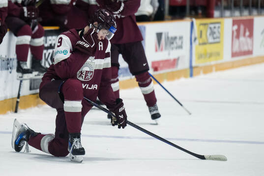 Eriks Mateiko of Latvia looks dejected