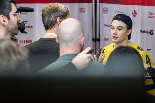 Axel Sandin-Pellikka of Sweden in mixed zone