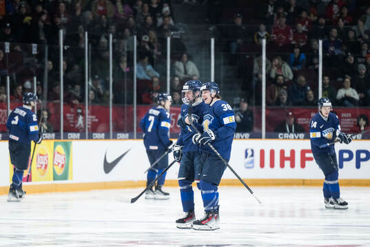 Heikki Ruohonen and Jesse Kiiskinen of Finland celebrates
