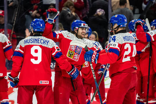 Adam Zidlicky of Czech Republic celebrates with team mates