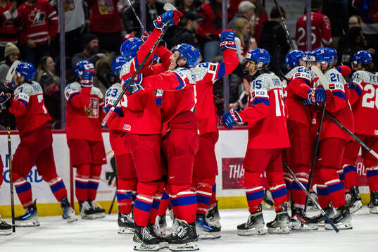Petr Sikora of Czech Republic celebrates with team mates