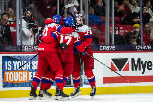 Adam Jecho of Czech Republic celebrates with team mates