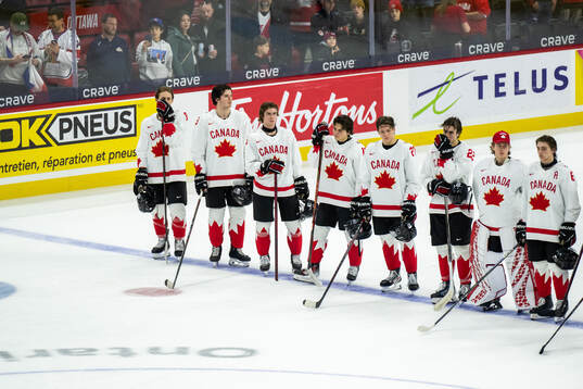 Players of Canada look dejected