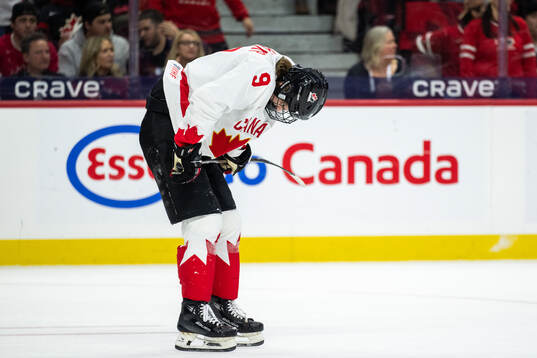 Gavin McKenna of Canada in pain