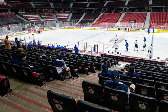 Players of Sweden watch a practice session of the Finnish