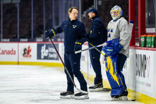Goaltender coach Viktor Alm and goaltender Melker Thelin of