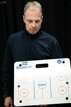Head coach Magnus Hävelid of Sweden is interviewed holding