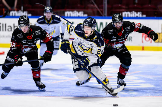 Malmö Redhawks Joona Ikonen och HV71s Oscar Fisker