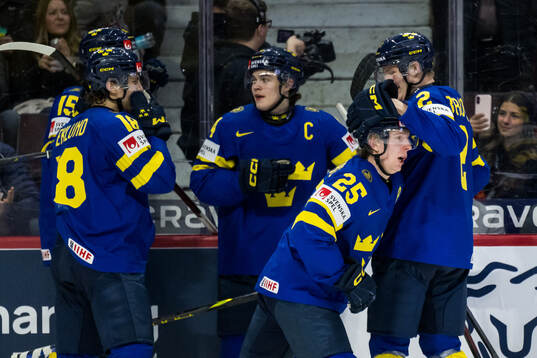 Otto Stenberg of Sweden celebrate with Victor Eklund, David