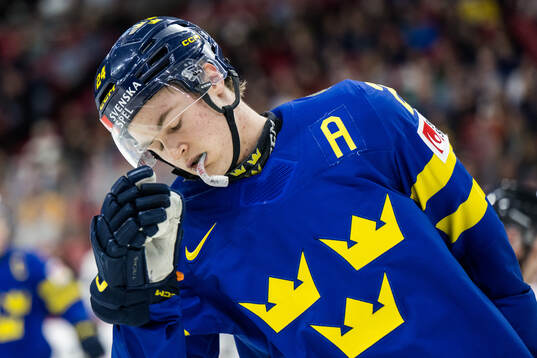 Tom Willander of Sweden looks dejected