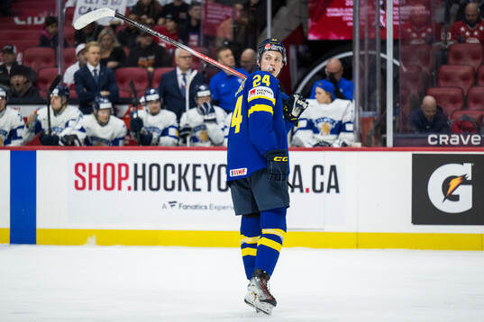 Tom Willander of Sweden looks dejected