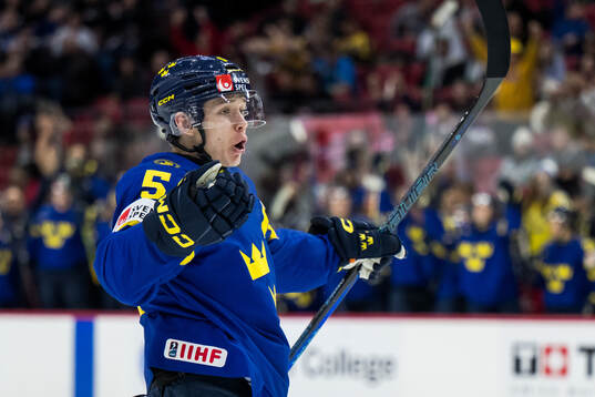 Wilhelm Hallquist of Sweden celebrates