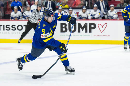 Wilhelm Hallquist of Sweden scores the 3-3 goal