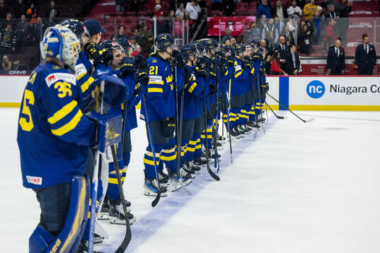 Players of Sweden look dejected