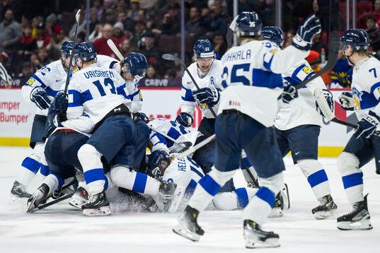 Players of Finland celebrate