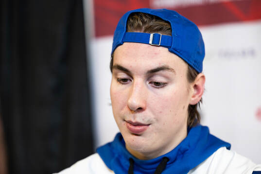 Emil Hemming of Finland is interviewed in the mixedzone
