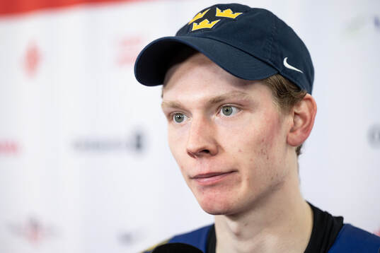 Goaltender Melker Thelin of Sweden is interviewed in the