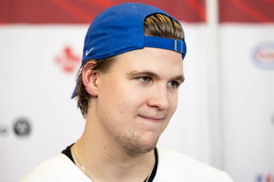 Kasper Halttunen of Finland is interviewed in the mixedzone